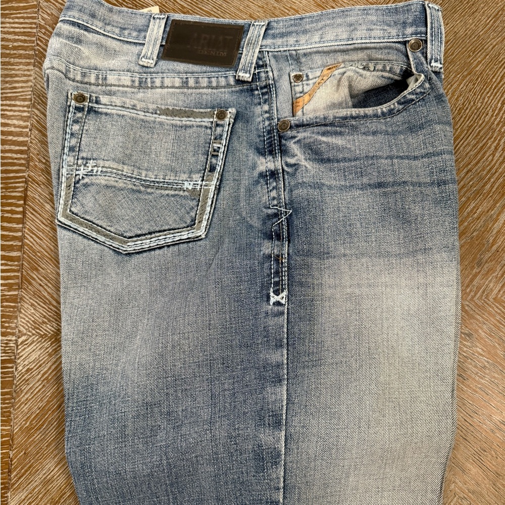 Men’s Ariat relaxed fit boot cut blue jeans. Size 36x38